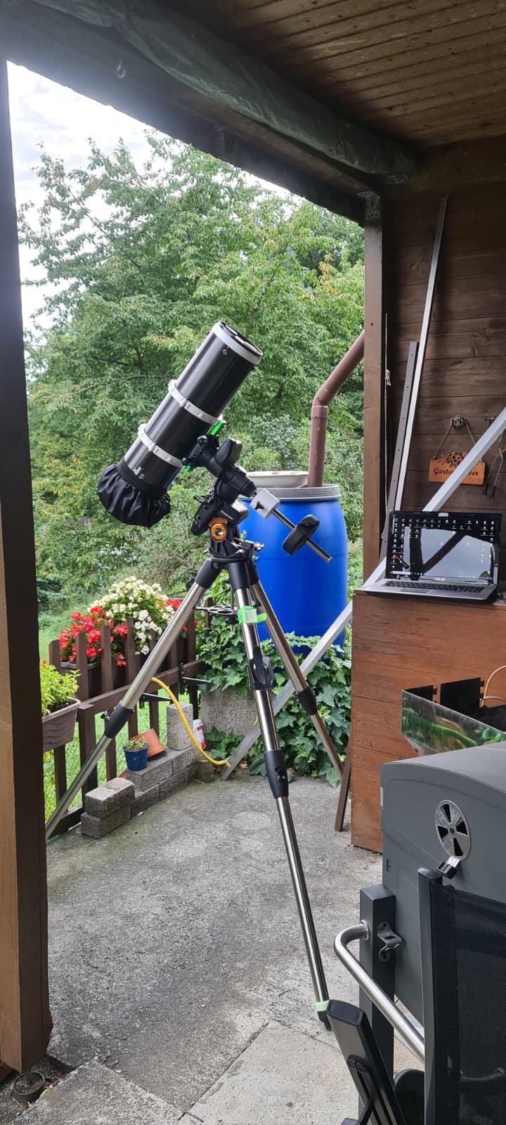 Telescope on a balcony ready for the night